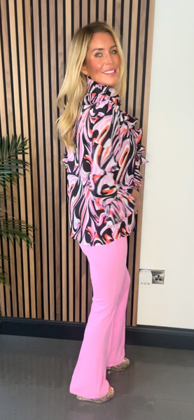 Pink flare trousers