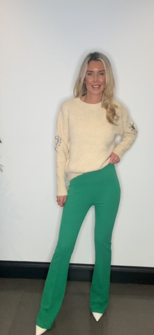 Green flare trousers