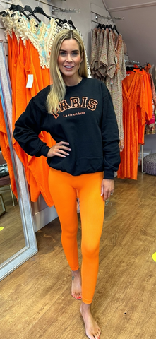 Orange ribbed leggings